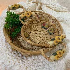 2 wicker baskets with flower decor